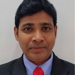 A man in a suit with a blue shirt and red tie stands confidently, embodying the precision akin to OpenRoads Designer, set against a plain background. A man in a suit with a blue shirt and red tie stands confidently, embodying the precision akin to OpenRoads Designer, set against a plain background.