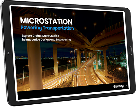 Tablet displaying a nighttime image of a highway and bridges with the text, "MICROSTATION Powering Transportation - Explore Global CAD Case Studies in Innovative Design and Engineering" on the screen. | Bentley Systems | Infrastructure Engineering Software Company Tablet displaying a nighttime image of a highway and bridges with the text, "MICROSTATION Powering Transportation - Explore Global CAD Case Studies in Innovative Design and Engineering" on the screen.